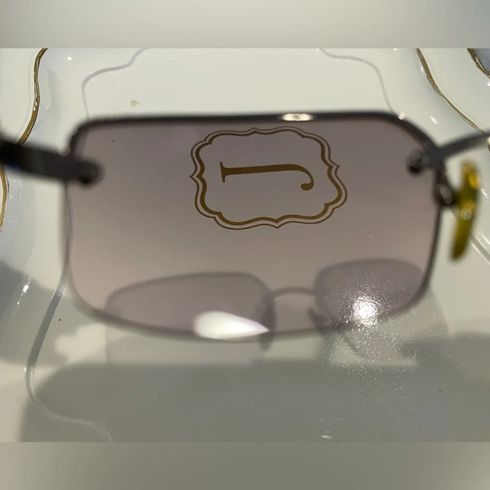Coach Gold and Gray Sunglasses Rimless Design